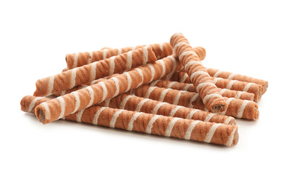 Tasty wafer roll sticks on white background. Crispy food