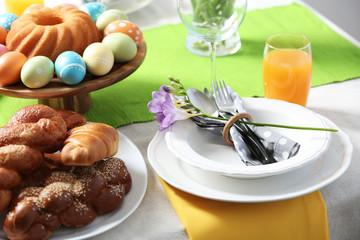 Obraz na płótnie Canvas Festive Easter table setting with traditional meal