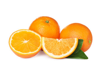 Fresh ripe oranges with leaves isolated on white