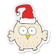 sticker of a cartoon owl wearing christmas hat