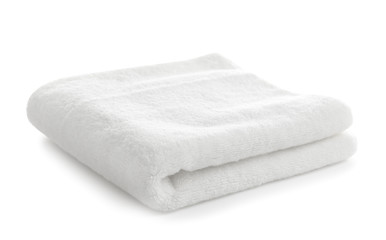 Folded clean soft towel on white background