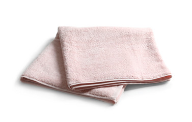 Folded soft terry towel on white background