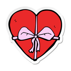sticker of a cartoon heart shaped present