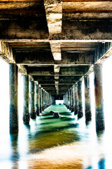 Landscape, travelling background, photo of view under the pier at a beach of Koh Mak island, Trad province, Thailand