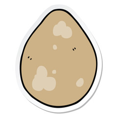 sticker of a cartoon egg