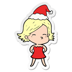 sticker cartoon of a woman wearing santa hat