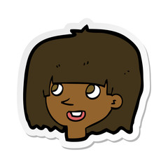 sticker of a cartoon happy female face