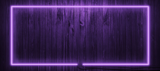 Fototapety  Neon light on wooden wall background.