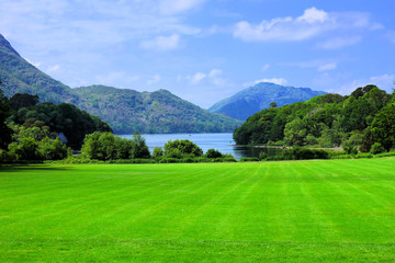Fototapeta na wymiar View of Lough Leane from the Muckross House gardens in Killarney National Park, Ring of Kerry, Ireland