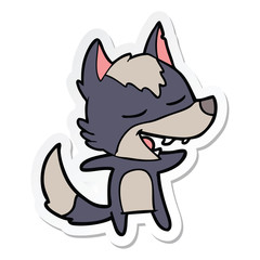 sticker of a cartoon wolf laughing