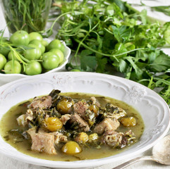 green plum  with Meat stew and greens. Georgian dish 