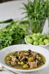 green plum  with Meat stew and greens. Georgian dish 