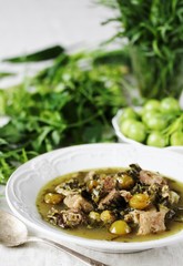 green plum  with Meat stew and greens. Georgian dish 