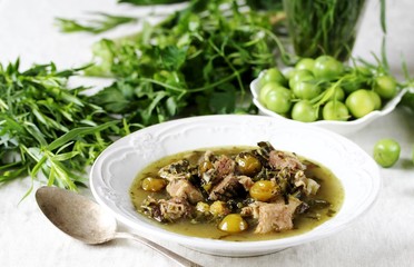 green plum  with Meat stew and greens. Georgian dish 
