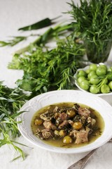 green plum  with Meat stew and greens. Georgian dish 