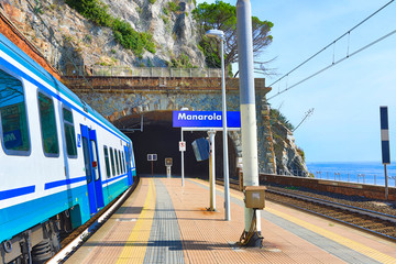 The train is the preferred mode of transportation in Cinque Terre, Italy.  This platform is in Manarola.