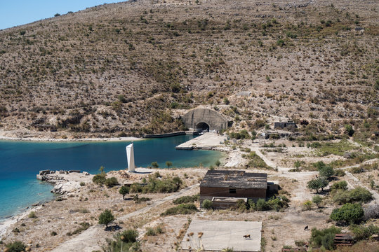 Old and abandoned submarine base with the entrance of an uboat bunker in Porto Palermo in Albania of the Enver Hoxha regime