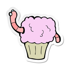 sticker of a cartoon worm in cupcake
