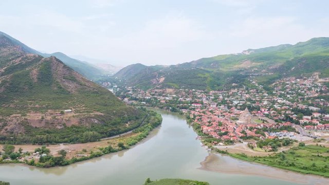 Beautiful timelapse of old Georgian town Mtskheta. Panorama of unesco town Mtskheta from Jvari church near Tbilisi in Georgia