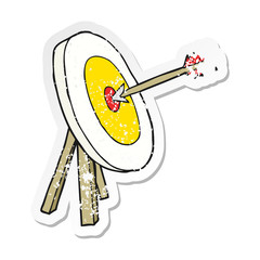 retro distressed sticker of a cartoon archery target