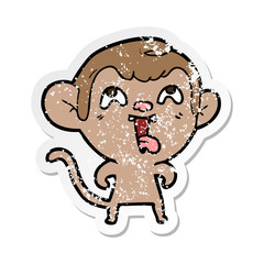 distressed sticker of a crazy cartoon monkey