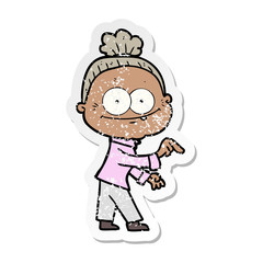 distressed sticker of a cartoon happy old woman