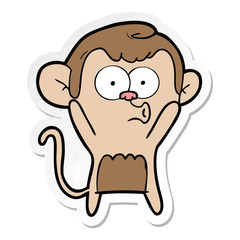 sticker of a cartoon surprised monkey