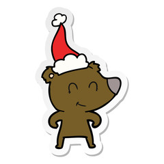female bear sticker cartoon of a wearing santa hat