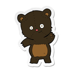 sticker of a cute black bear cartoon