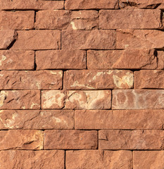 Obraz premium Orange facing stone, slate, sandstone and travertine marble texture