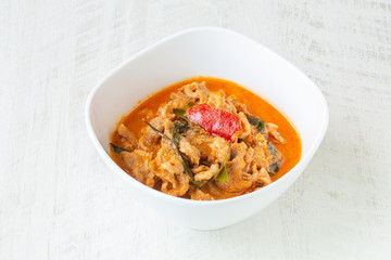 Panang Curry with Pork on white background.