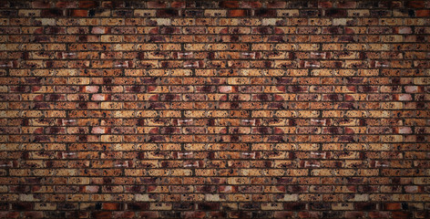 Old brick wall. Horizontal wide brick wall background.