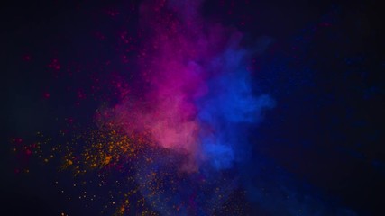 Super slowmotion shot of color color smoke isolated on blue background.
