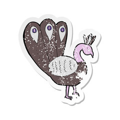 retro distressed sticker of a cartoon peacock
