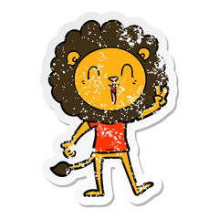 distressed sticker of a laughing lion giving peace sign