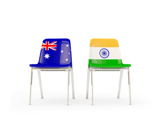 Two chairs with flags of Australia and india