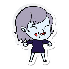 sticker of a cartoon vampire girl with blood on cheek