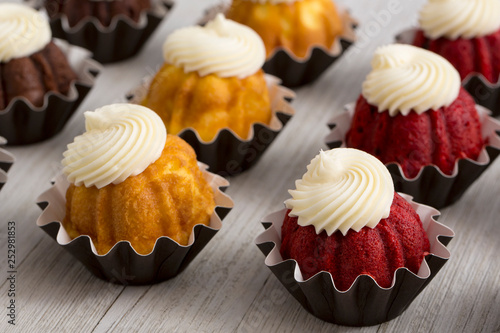 Mini Bundt Cakes With Cream Cheese Icing Stock Photo And Royalty
