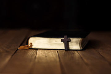 cross on book