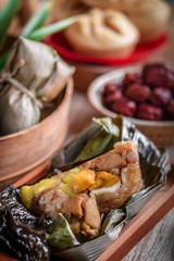 Chinese New Year party table with food and traditional decorations.