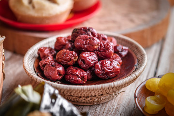 Dried red date or Chinese jujube. Traditional herbal medicine spill