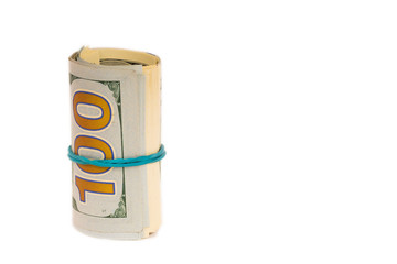 Obraz na płótnie Canvas 100 dollars roll isolated on white background