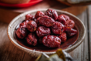 Dried red date or Chinese jujube. Traditional herbal medicine spill