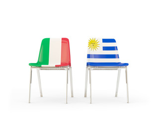 Two chairs with flags of Italy and uruguay