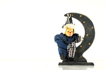 Pierrot toy doll on white background