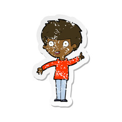 retro distressed sticker of a cartoon boy with idea