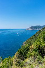 Fototapeta na wymiar Italy, Cinque Terre, Corniglia, an island in the middle of a body of water