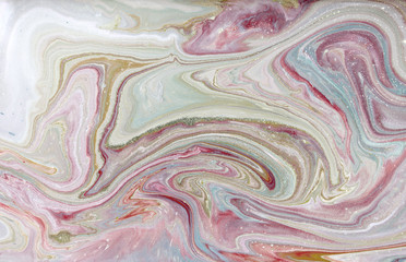 Pale gold marbling pattern. Golden marble liquid texture.