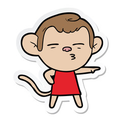 sticker of a cartoon suspicious monkey