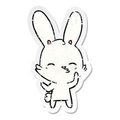 distressed sticker of a curious bunny cartoon